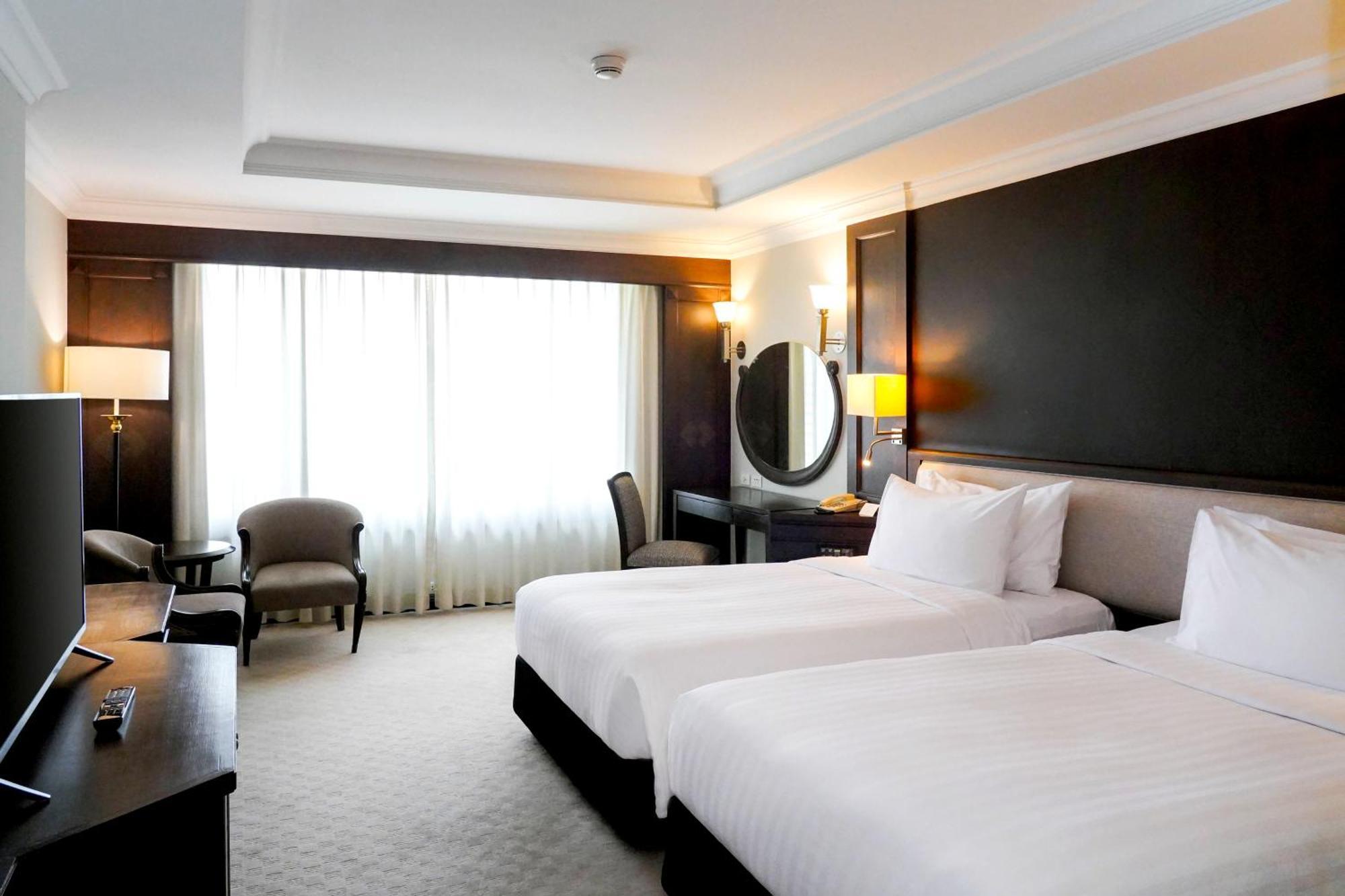 Grand Mercure Bangkok Atrium Exterior foto Deluxe Room