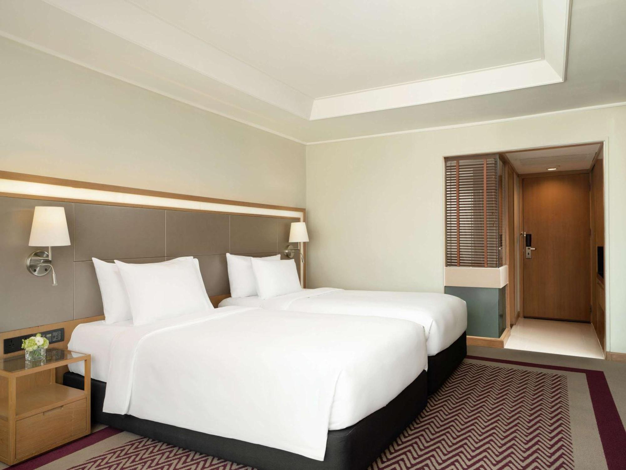 Grand Mercure Bangkok Atrium Exterior foto Deluxe Room